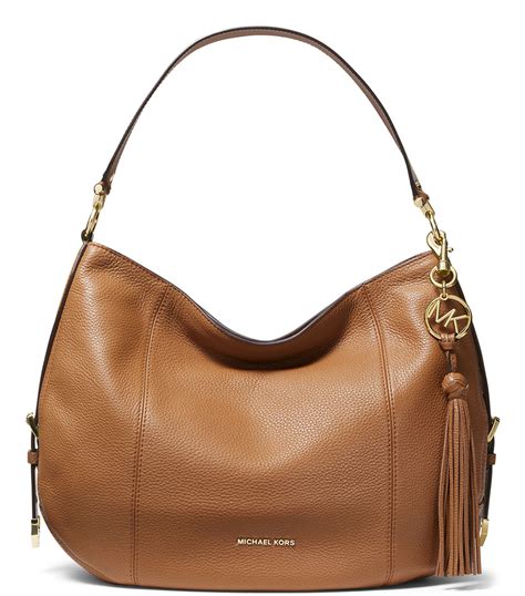 los bolsos de michael kors son de piel|bolsas Michael Kors originales.